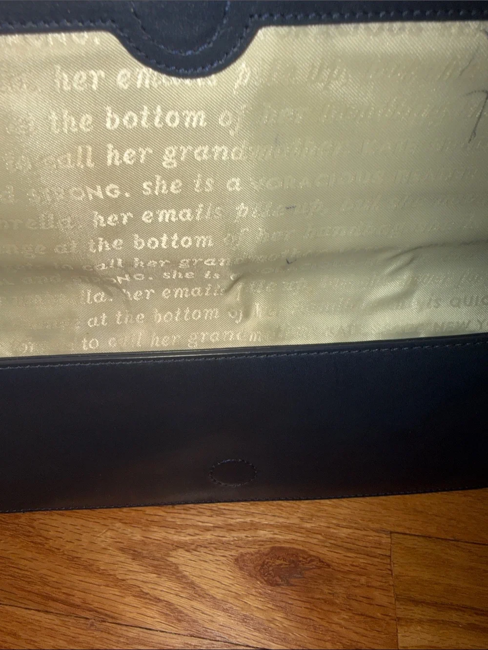 kate spade navy leather clutch with white limo applique and silver studs